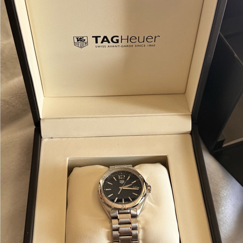 Tag Heuer Black And Silver Timepiece